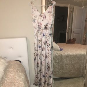 Mumu XS long sleeveless dress with front slit.